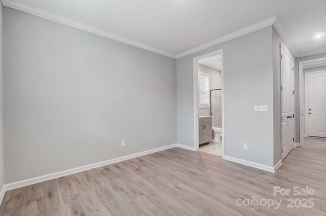 BEDROOM FIVE (GUEST SUITE), MAIN LEVEL | Image 24