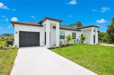 2420-2422 Ansel Ave S, Home with 6 bedrooms, 4 bathrooms and null parking in Lehigh Acres FL | Image 3