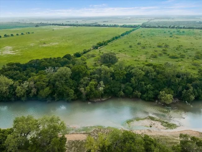 Drone / aerial view featuring a rural view and a water view | Image 34