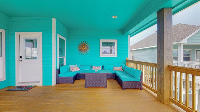 This vibrant costal furniture comes with the sale of the home. | Image 9