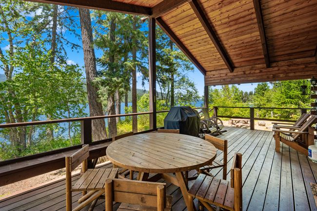 Covered deck with outdoor dining area | Image 6