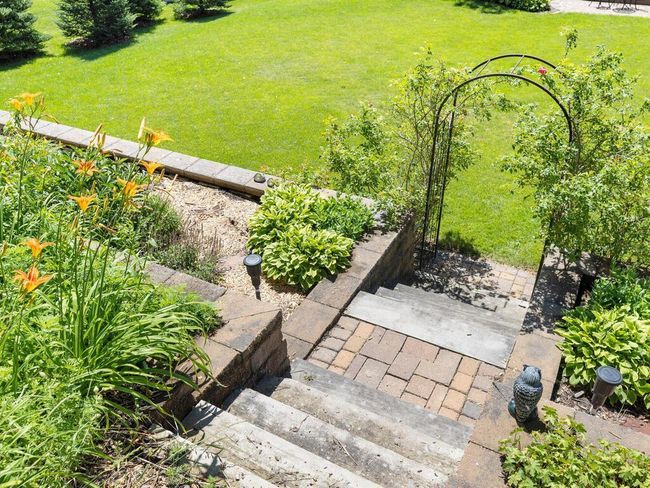 Custom tiered steps, retaining wall, and planting areas | Image 53