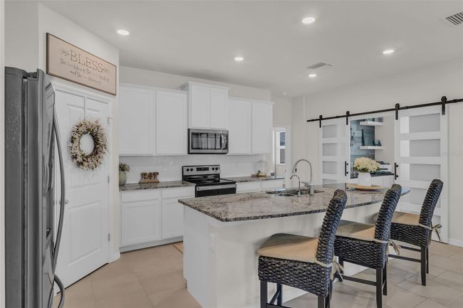 10815 Laxer Cay Loop, House other with 4 bedrooms, 4 bathrooms and null parking in San Antonio FL | Image 18