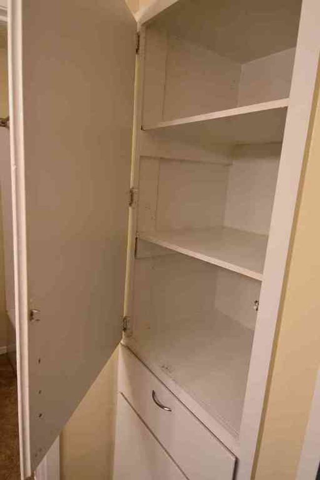 View of bathroom storage | Image 8