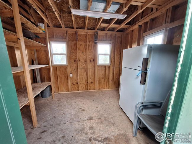 Interior of shed, refrigerator included. | Image 30