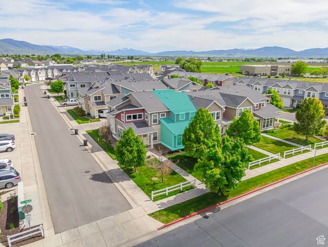 Aerial perspective of suburban area with a mountainous background | Image 23