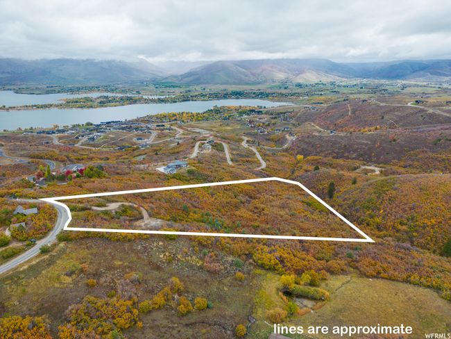 Aerial view featuring a water and mountain view | Image 24