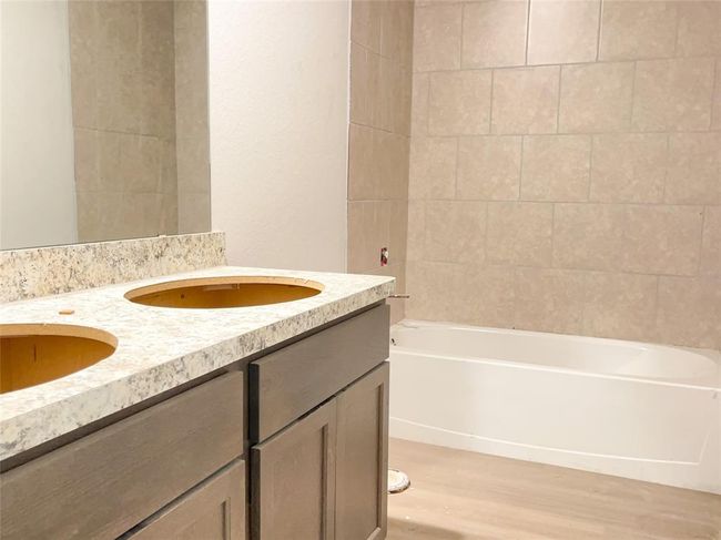 Spacious double-sink vanity in the soon-to-be-completed upstairs bathroom. | Image 10