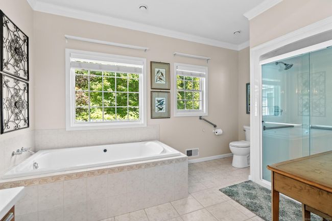Soaking tub AND a walk-in shower. | Image 13