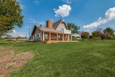 View of front of house with a front yard and a porch | Image 2