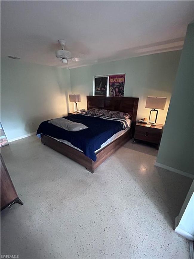 Bedroom featuring ceiling fan | Image 10
