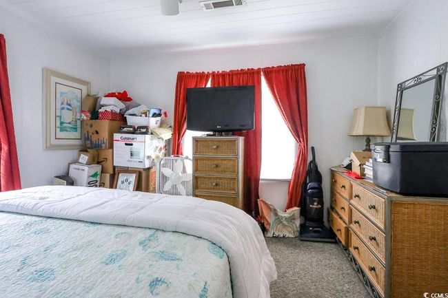 Bedroom with carpet | Image 33