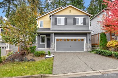 Front of home facing two car garage | Image 1