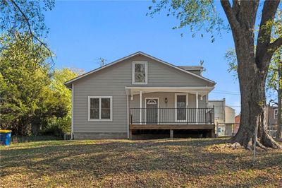 View of front of home with a front lawn and a porch | Image 2