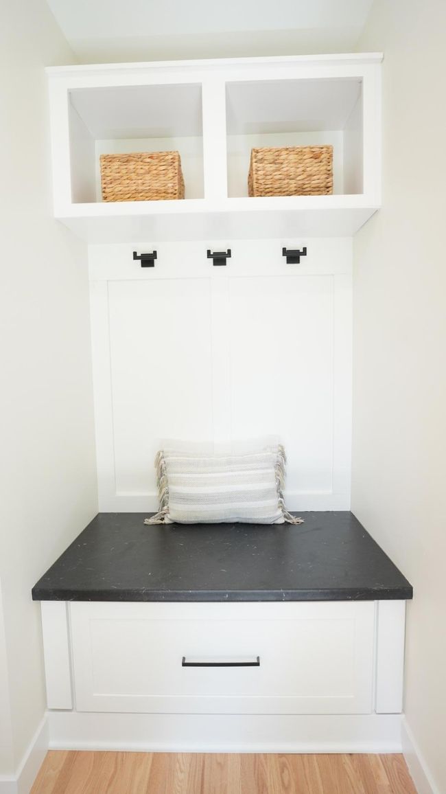 Converted from a small closet, the mudroom off the back door is stylish and offers plenty of storage. There is another large coat closet just off the front entry as well. | Image 8