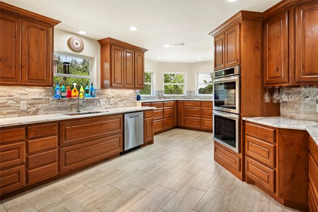 Can lighting, under cabinet lighting, soft-close knotty alder cabinets | Image 5