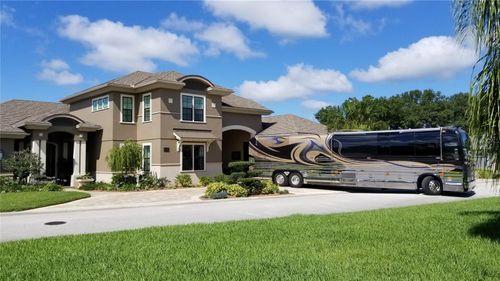 414 Meandering Way, Polk City, FL, 33868-5139 | Card Image