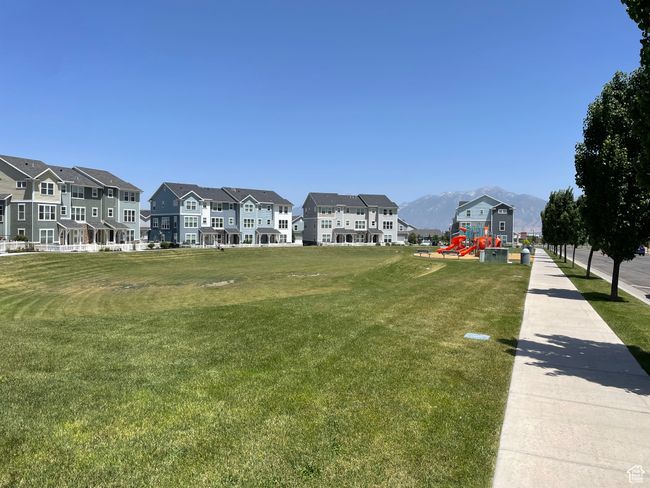 Surrounding community featuring a mountain view, a lawn, and a residential view | Image 39