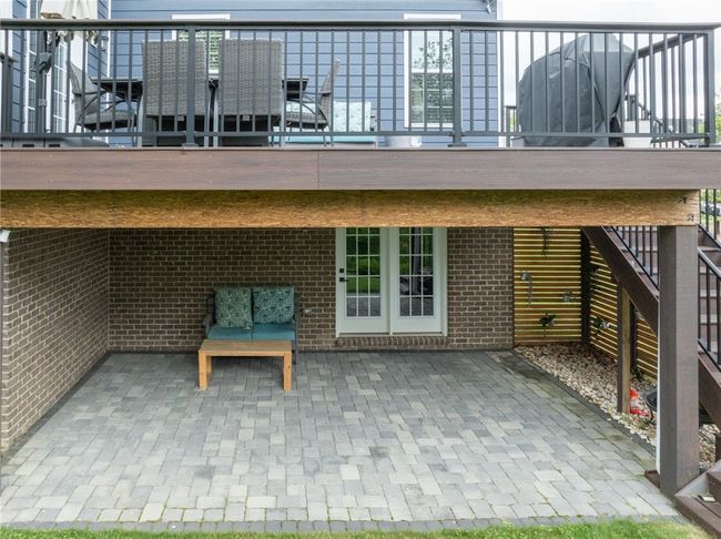 Covered Patio From Walkout Basement Includes A Custom Privacy Screen And Is Waterproof From Deck Above. | Image 43