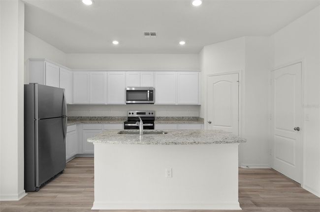13291 Tula Loop, House other with 4 bedrooms, 3 bathrooms and null parking in ASTATULA FL | Image 7