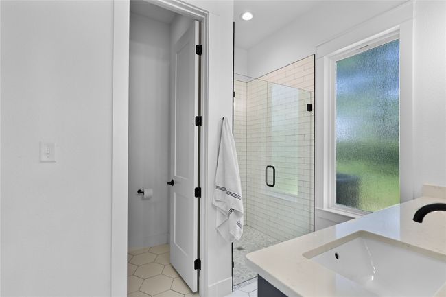Bathroom featuring tile patterned floors, vanity, recessed lighting, and a stall​​‌​​​​‌​​‌‌​‌‌​​​‌‌​​‌‌​‌​​​​​‌ shower | Image 22