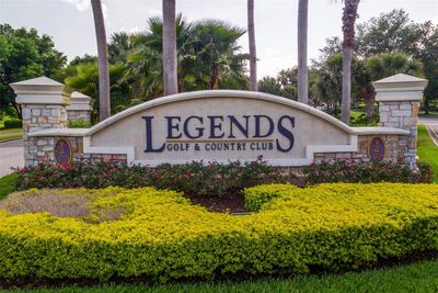 This exceptional property is nestled in the prestigious Legends Golf and Country Club community, renowned for its sought-after lifestyle and world-class amenities. | Image 2