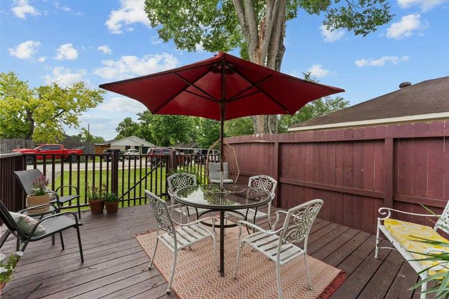 Welcoming front porch with a cozy sitting area—perfect for sipping your morning coffee or relaxing in the evening breeze | Image 21