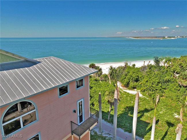 Property view of water with a beach view | Image 8