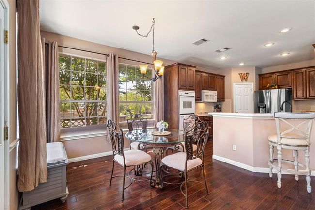 Breakfast area towards the rear of the home. | Image 8