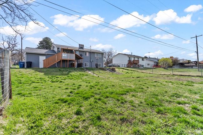 View of yard featuring fence | Image 21