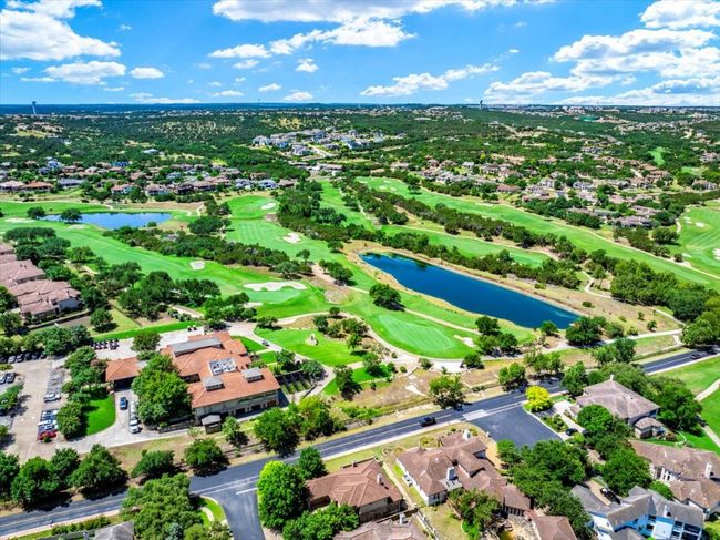 Aerial view of residential area with a nearby body of water and a golf club | Image 36