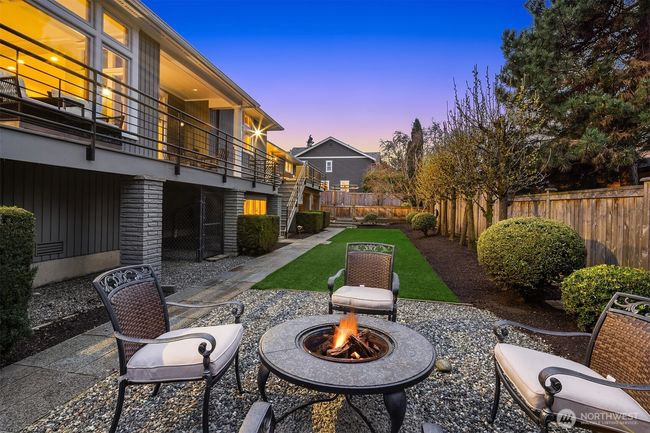Every single thing about this property is 'dialed in." Clean as a whistle and manicured to perfection, in the background check out the expansive turf area ... ready for your favorite backyard sport. | Image 34