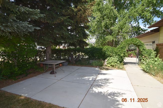 View of patio featuring a gate | Image 5