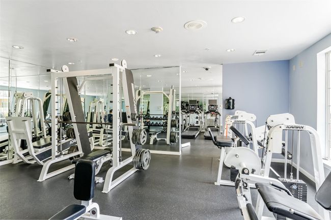 Exercise room with recessed lighting and healthy amount of natural light | Image 34