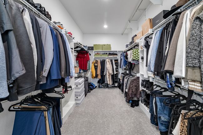 Walk in closet featuring carpet floors | Image 26