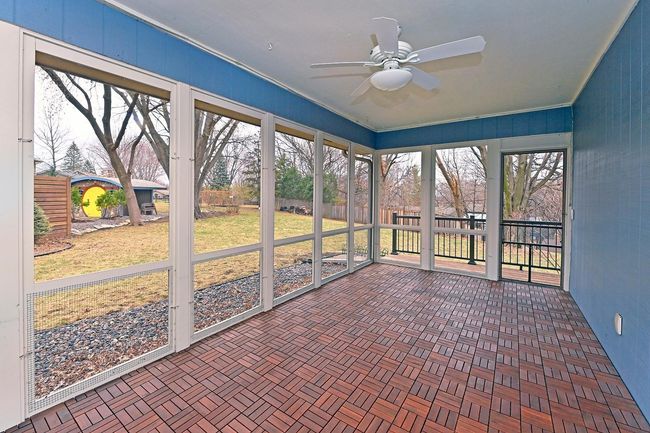 Fabulous Screen Porch with Parquet Flooring right off Kitchen Informal Dining Area! | Image 5