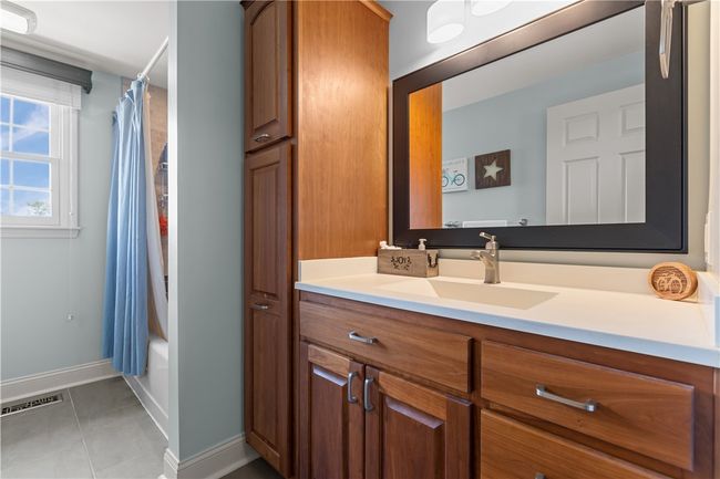 Updated main bathroom for additional bedrooms | Image 27