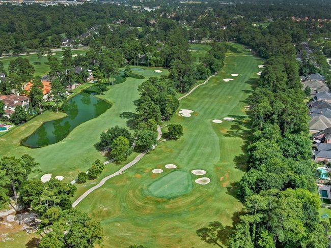 Located near the prestigious Northgate Forest area, this home places you within easy reach of some of the best golf in the region—ideal for weekend rounds or daily play with friends. | Image 40