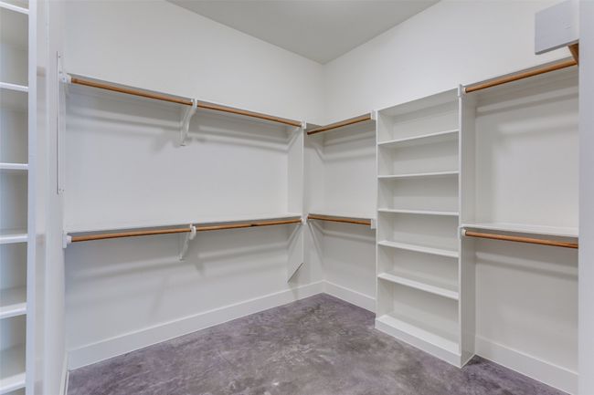 View of spacious closet | Image 19