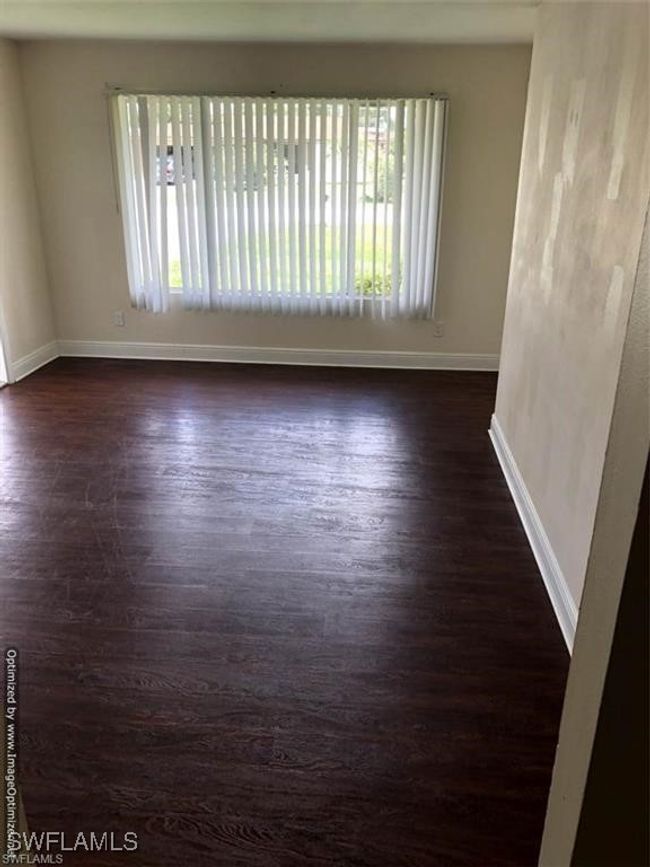 Spare room with hardwood / wood-style flooring | Image 6