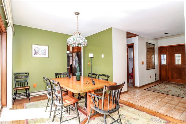 Open floor-plan flows throughout the house. | Image 17