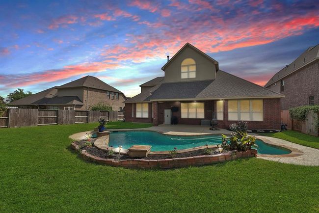Landscaping area behind the pool. | Image 39