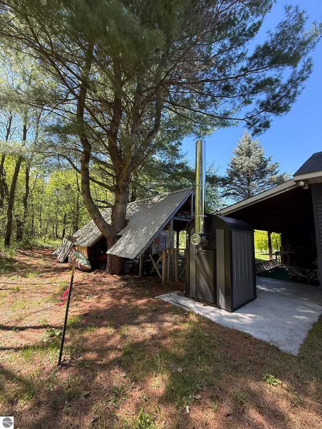 5867 Mabel Rd, House other with 5 bedrooms, 3 bathrooms and null parking in Williamsburg MI | Image 76