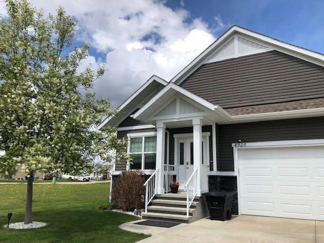 4920 Beardsley Avenue, Home with 4 bedrooms, 3 bathrooms and 2 parking in Lacombe AB | Image 2