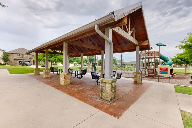 View of community featuring a patio area | Image 36