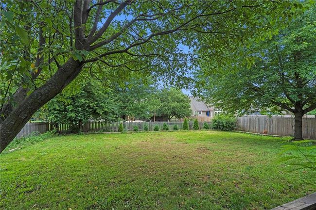 View of fenced backyard | Image 42