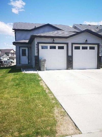 8073 91 St, House other with 5 bedrooms, 2 bathrooms and 4 parking in Grande Prairie AB | Image 1