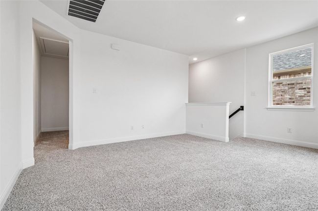 Empty room featuring light carpet and recessed lighting | Image 15
