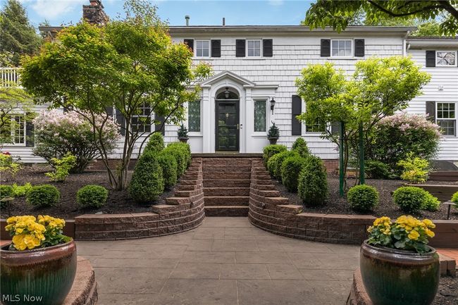 Colonial inspired home with a patio | Image 1