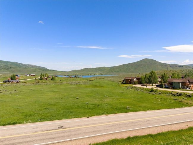 Lake and mountain views from deck and windows | Image 12